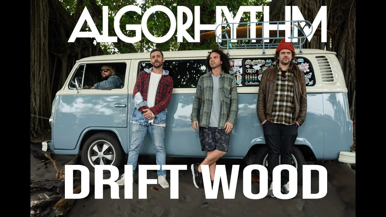 The band gathered beside a camper van in the Algorhythm video for Driftwood