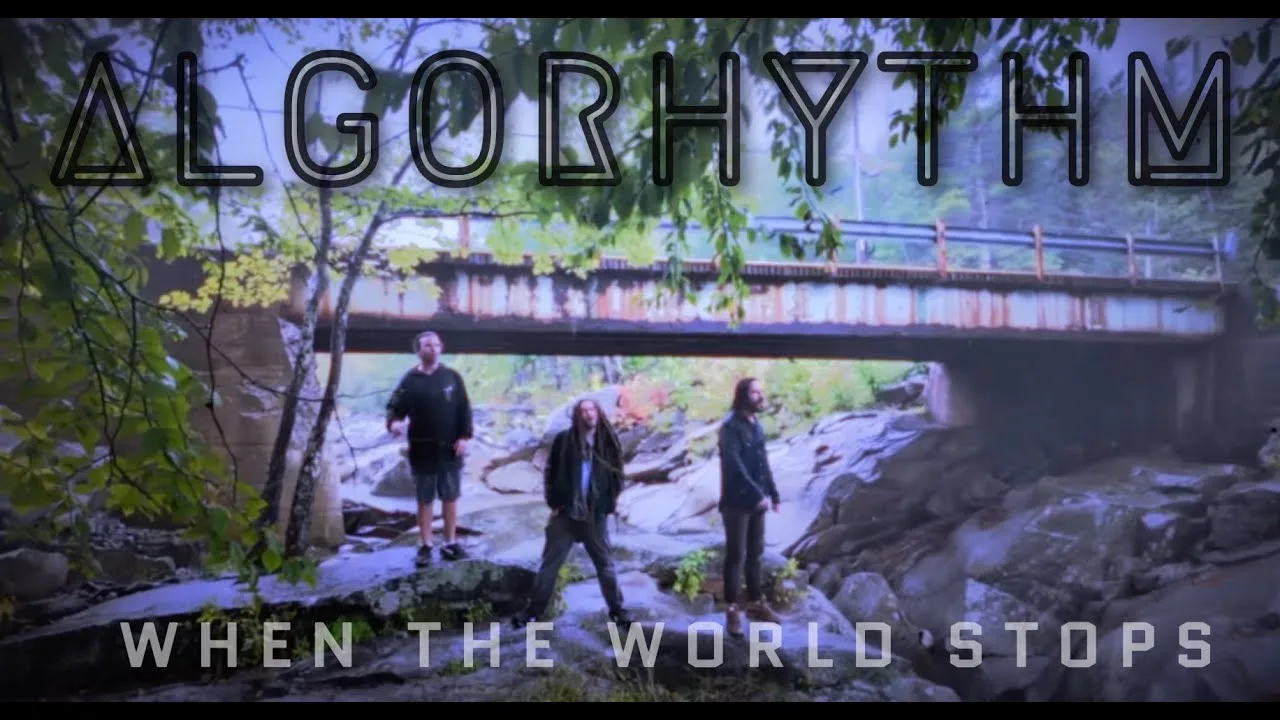 Title card for the Algorhythm music video When The World Stops